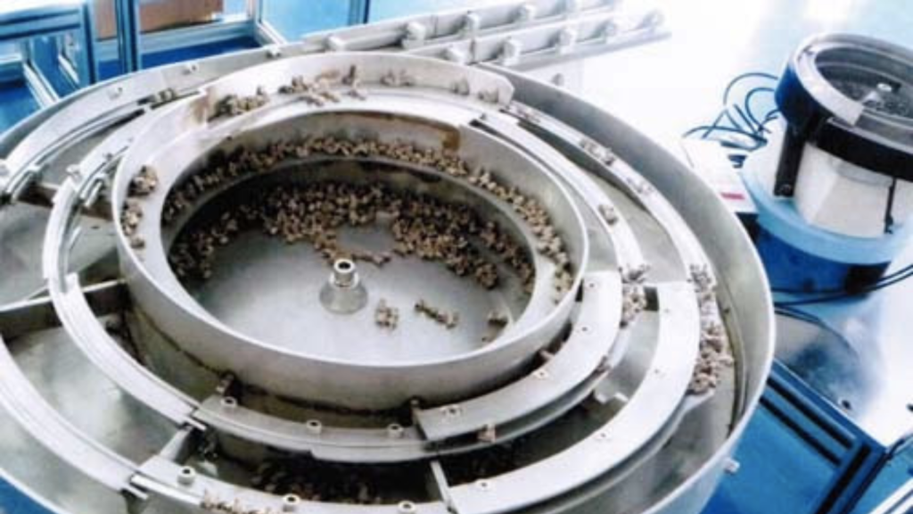 The Secret Behind Vibrating Bowl Feeder Efficiency - Industrial Feeder ...