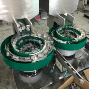 Máy cấp liệu rung cho máy khi xả kẹp