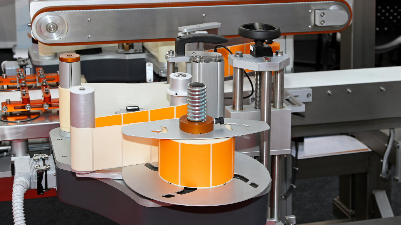 Máy dán nhãn cuộn là gì? Giải pháp hoàn hảo dán nhãn 360 độ cho chai lọ tròn 1 Cơ chế hoạt động cốt lõi của máy dán nhãn cuộn