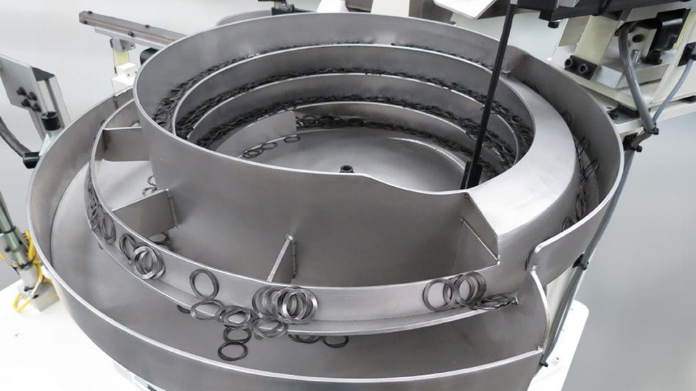 Máy cấp liệu rung đa năng: Bí quyết giảm thời gian chuyển đổi sản phẩm dưới 15 phút 2 Các công nghệ giúp máy rung trở nên đa năng