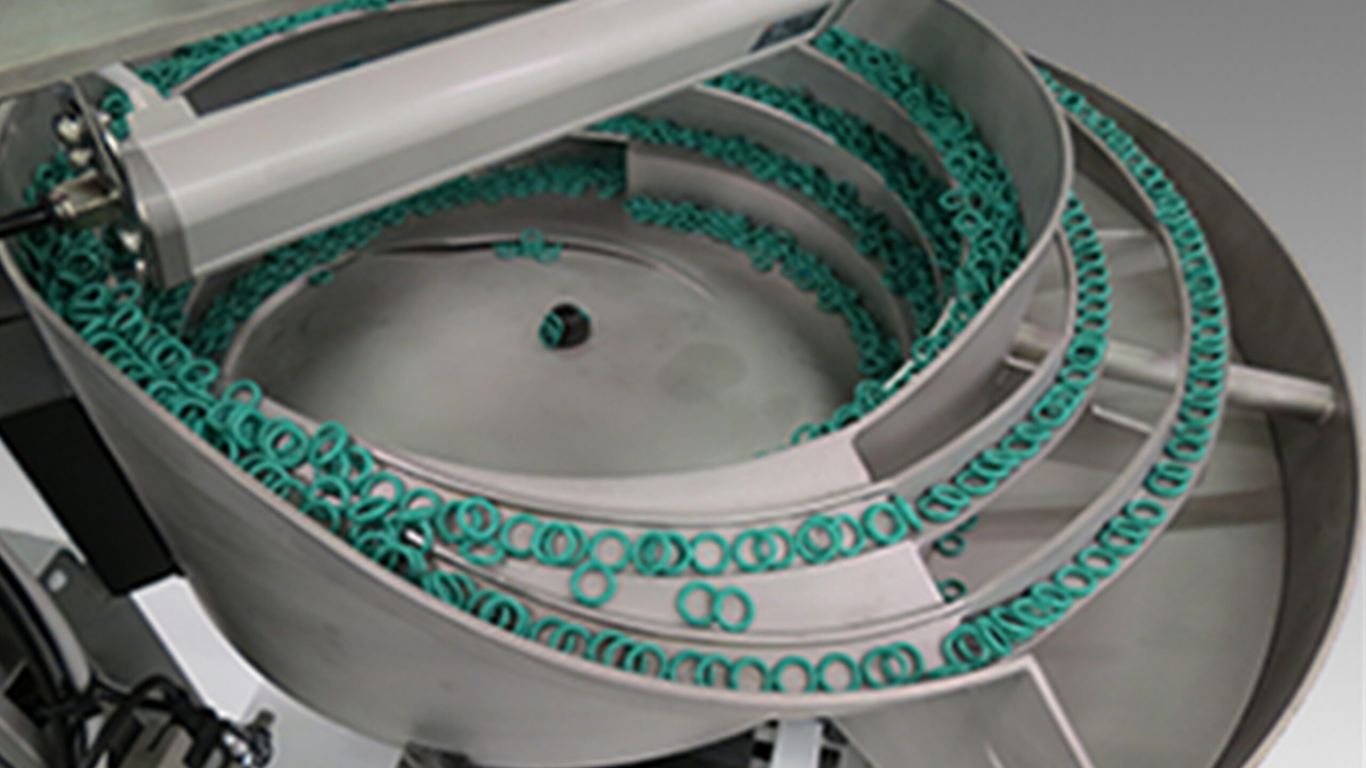 Máy cấp liệu rung đa năng: Bí quyết giảm thời gian chuyển đổi sản phẩm dưới 15 phút 1 Định nghĩa "Đa năng" trong máy cấp liệu rung