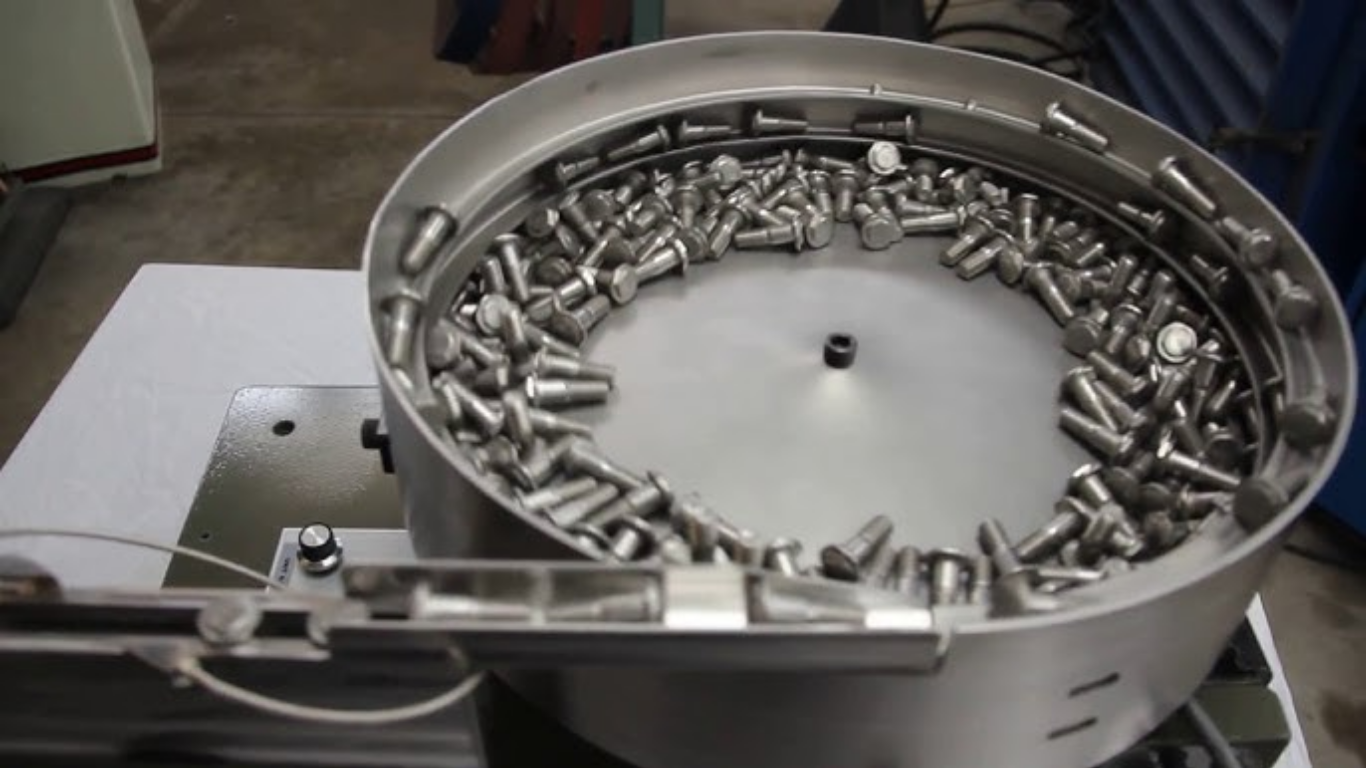 Máy cấp liệu rung chính hãng: 5 Lợi ích cốt lõi và cách nhận biết đơn giản 1 Máy cấp liệu rung chính hãng