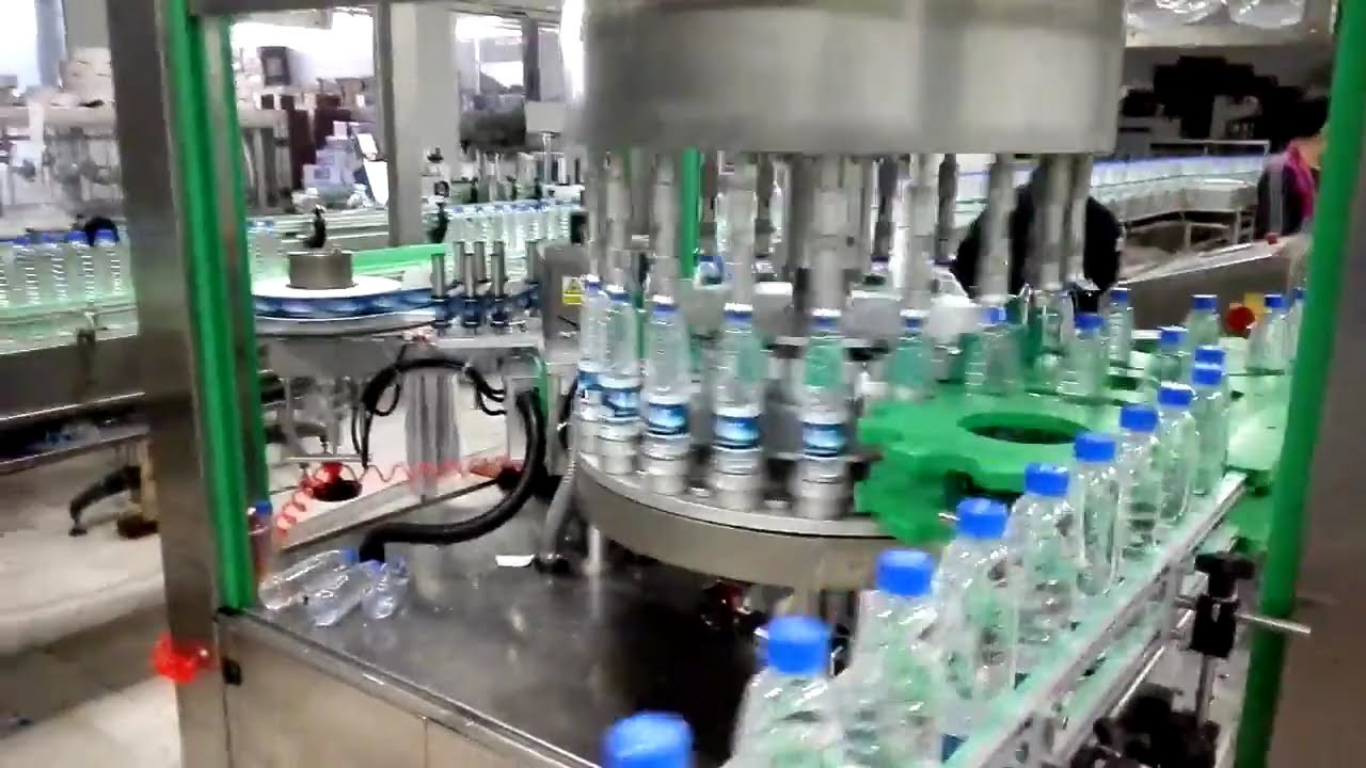 Máy dán nhãn chai nước suối tự động: Tốc độ cao, phẳng đẹp, không nhăn 2 Các dòng máy dán nhãn chai nước suối phổ biến nhất