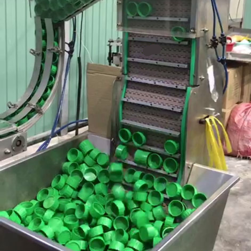 Bộ cấp liệu bậc thang cho nắp chai