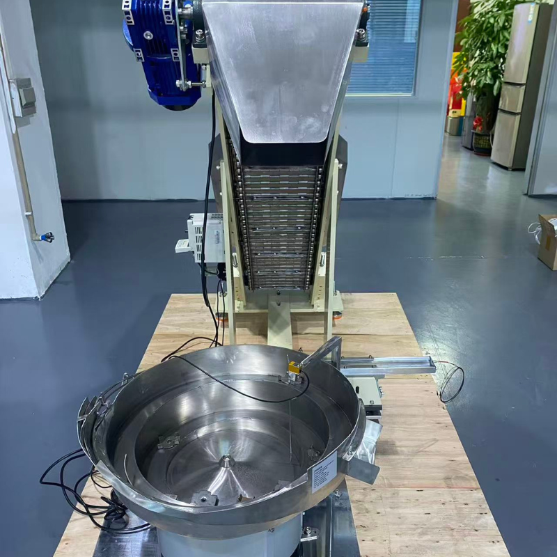 Bộ cấp liệu bậc thang cho viên nén: Giải pháp sạch, êm, không sứt mẻ 1 Máy cấp liệu bậc thang cho viên nén